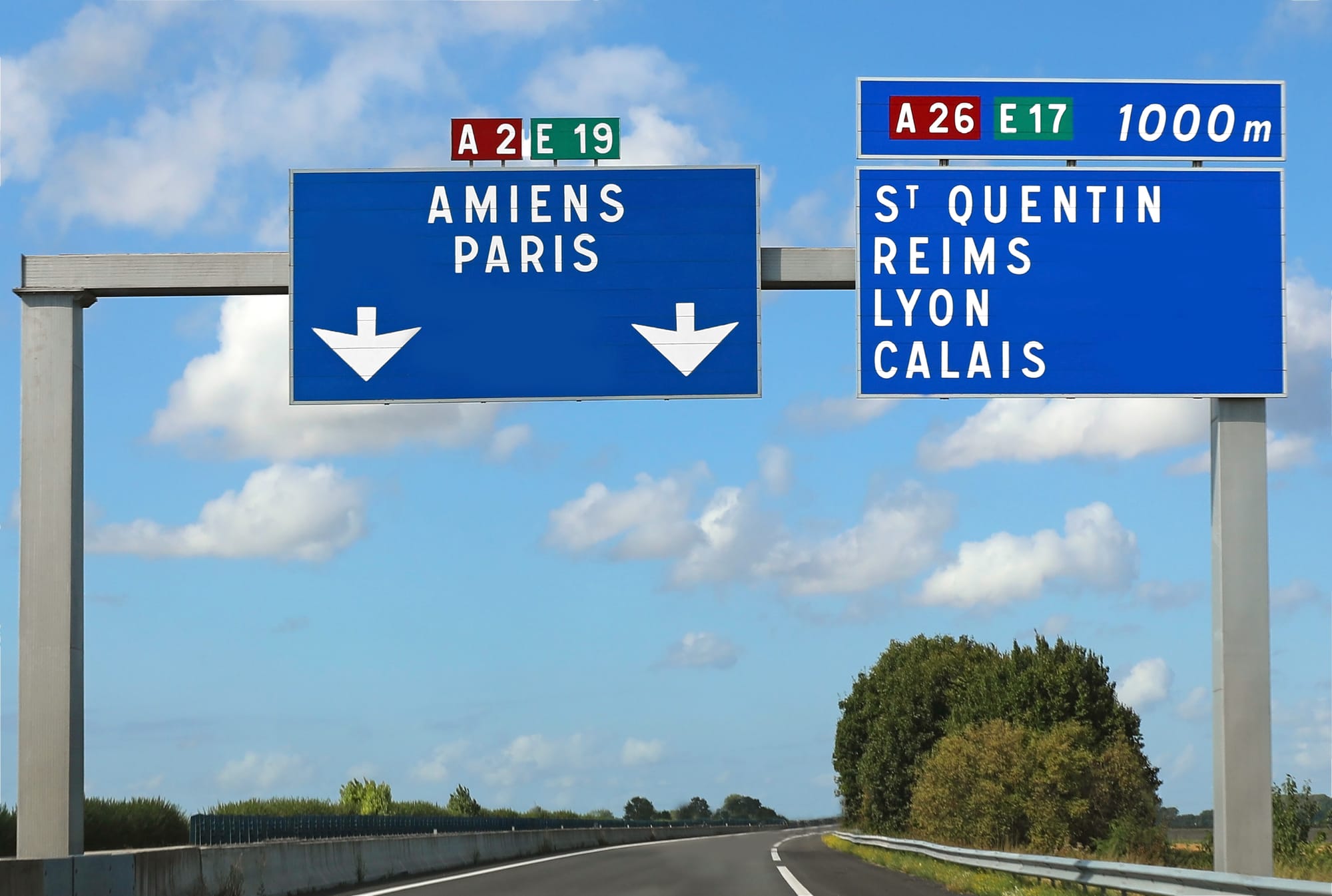 French road signs for Michelin tires guide restaurant hotels.