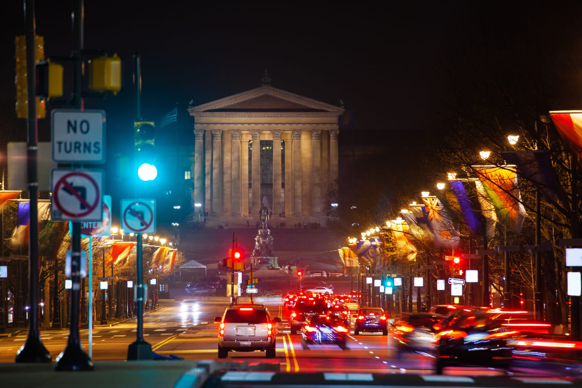 Image of Old City Philadelphia with cars and restaurants.