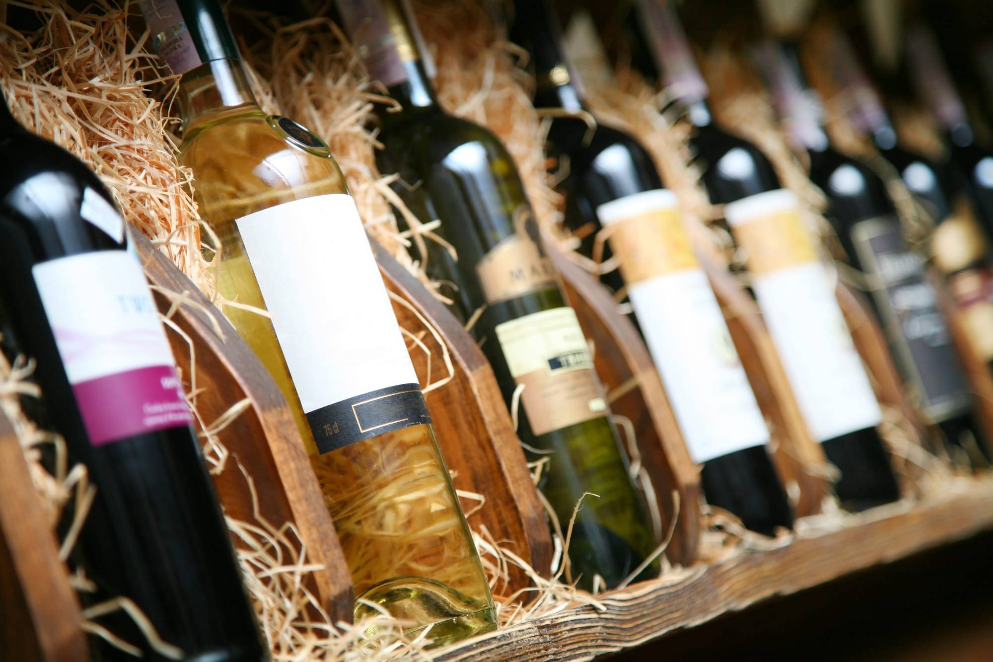 Wine bottles from a wine list at a restaurant that offers BYOB