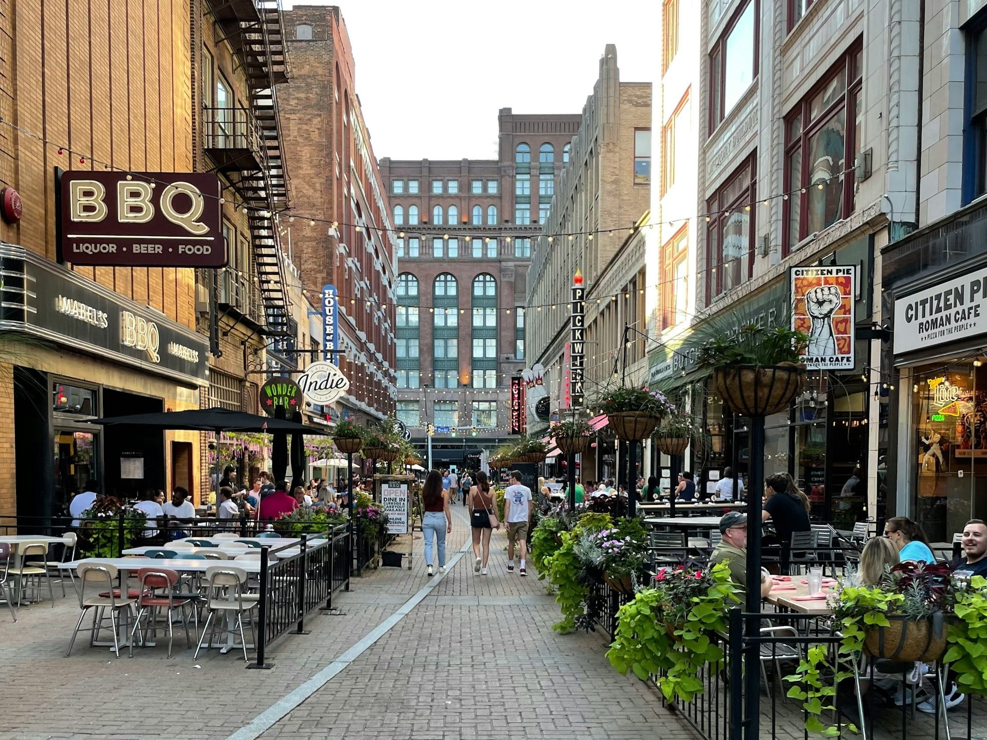 A downtown walkway with restaurants on either side