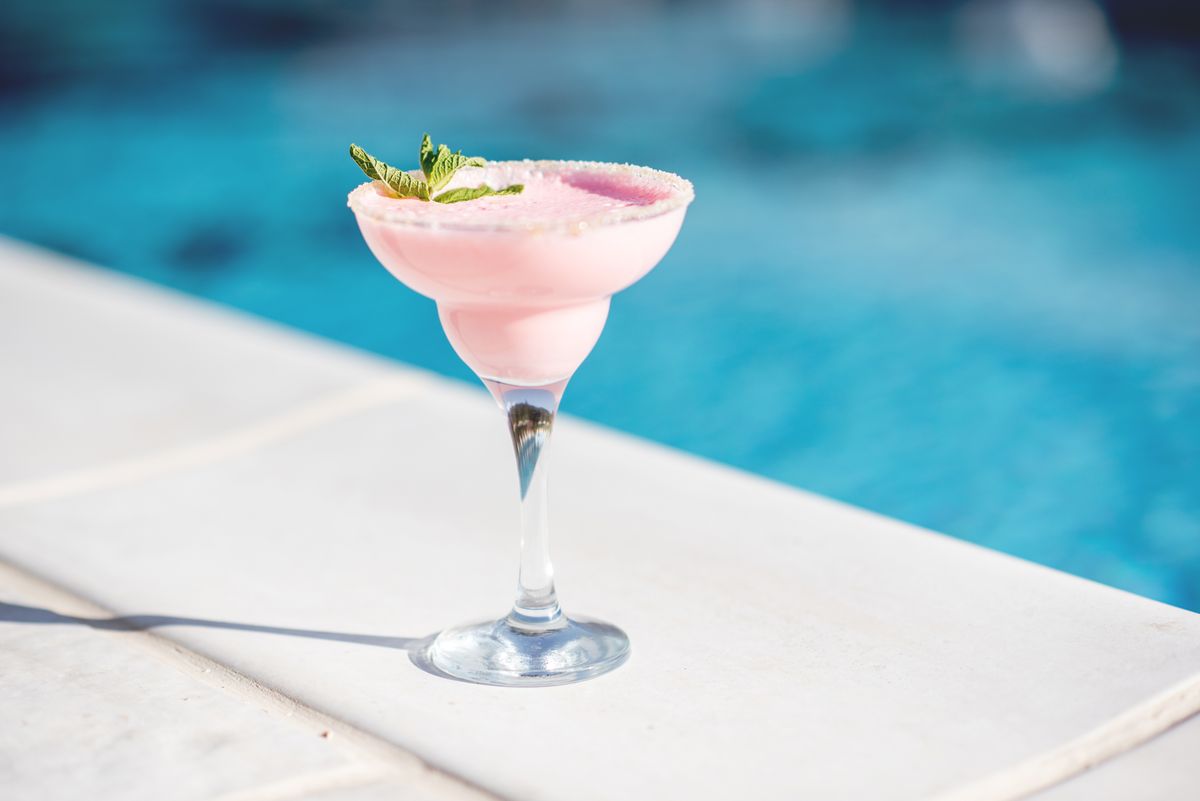 Barbie inspired cocktail drink by the summer pool.